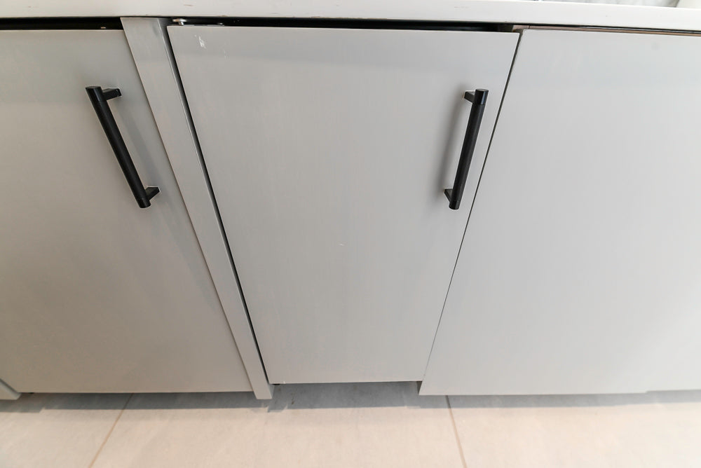 Custom Modern Light Grey Pantry with White Stone Countertops and Stainless Steel Sink