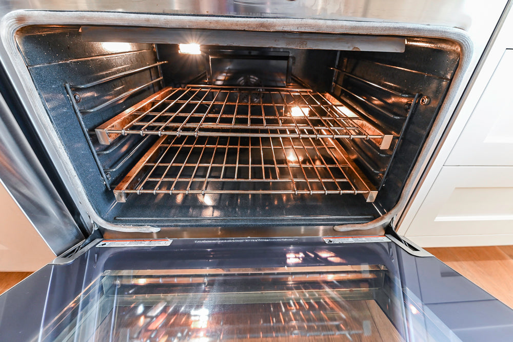 Ciuffo Cabinetry Transitional White Kitchen with Marble Countertops and Thermador Appliances