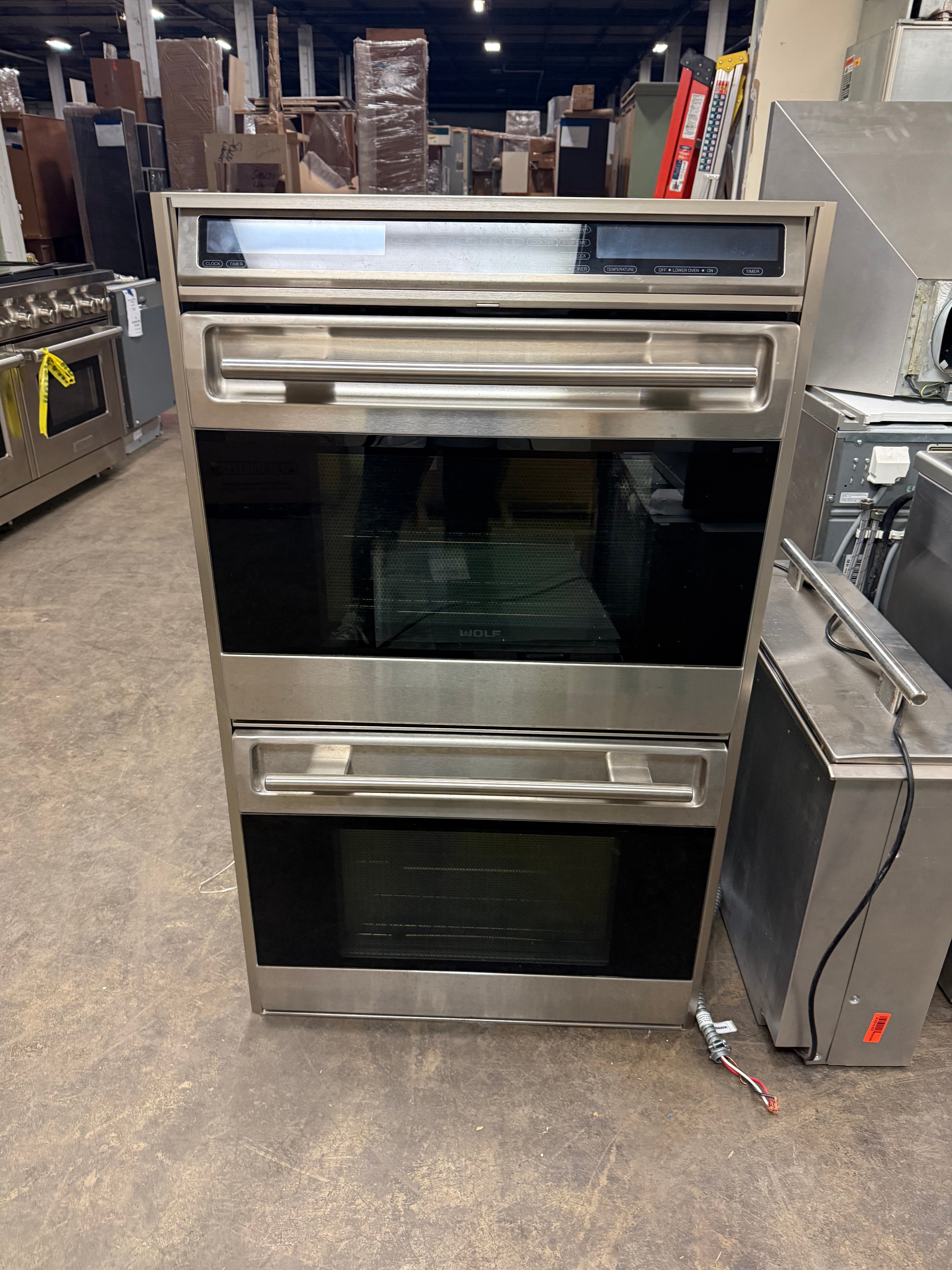 High-end Wolf wall oven with cobalt blue porcelain interior and touch controls