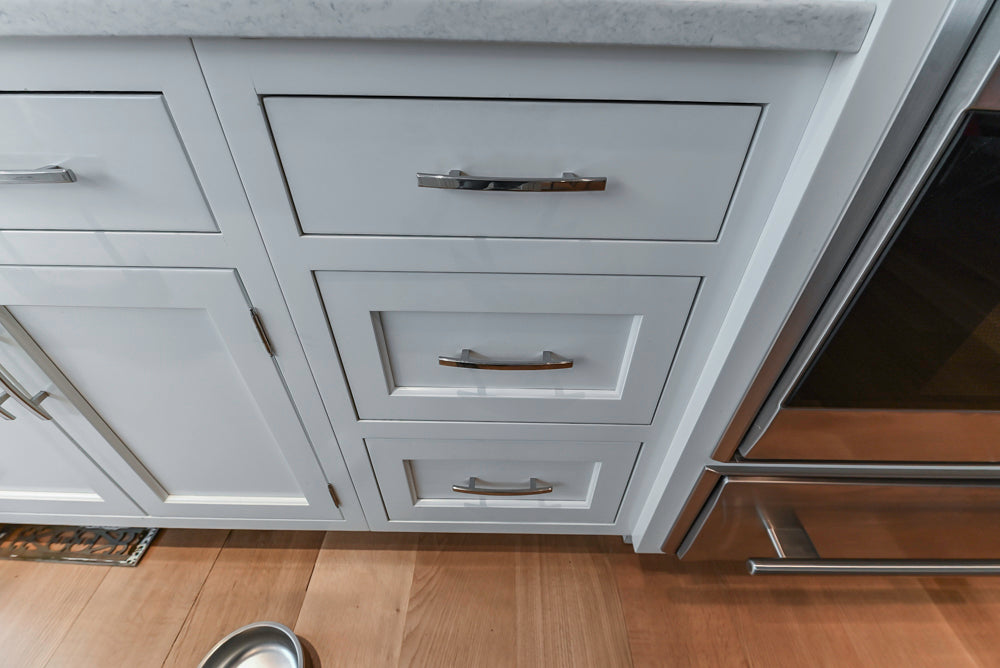 Plain & Fancy Transitional White Kitchen with Island, Countertops and Wolf & Sub-Zero Appliances