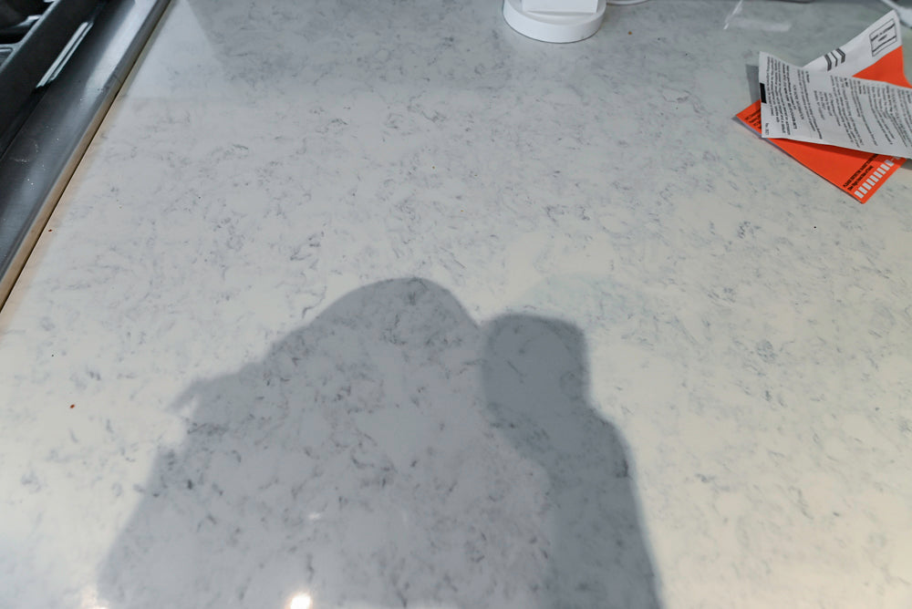 Plain & Fancy Transitional White Kitchen with Island, Countertops and Wolf & Sub-Zero Appliances