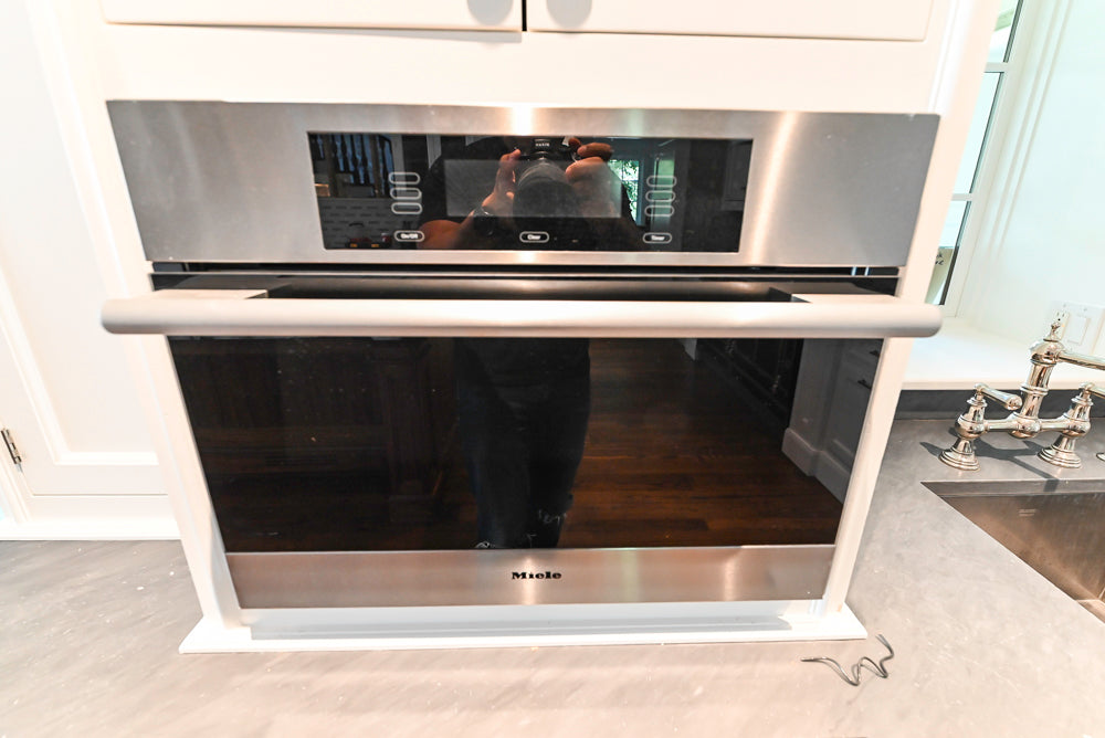 Christopher Peacock Transitional White Kitchen with Island and Miele Appliances