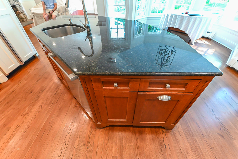 Custom Traditional White Kitchen with Wood Island, Granite Countertops and Wolf Range