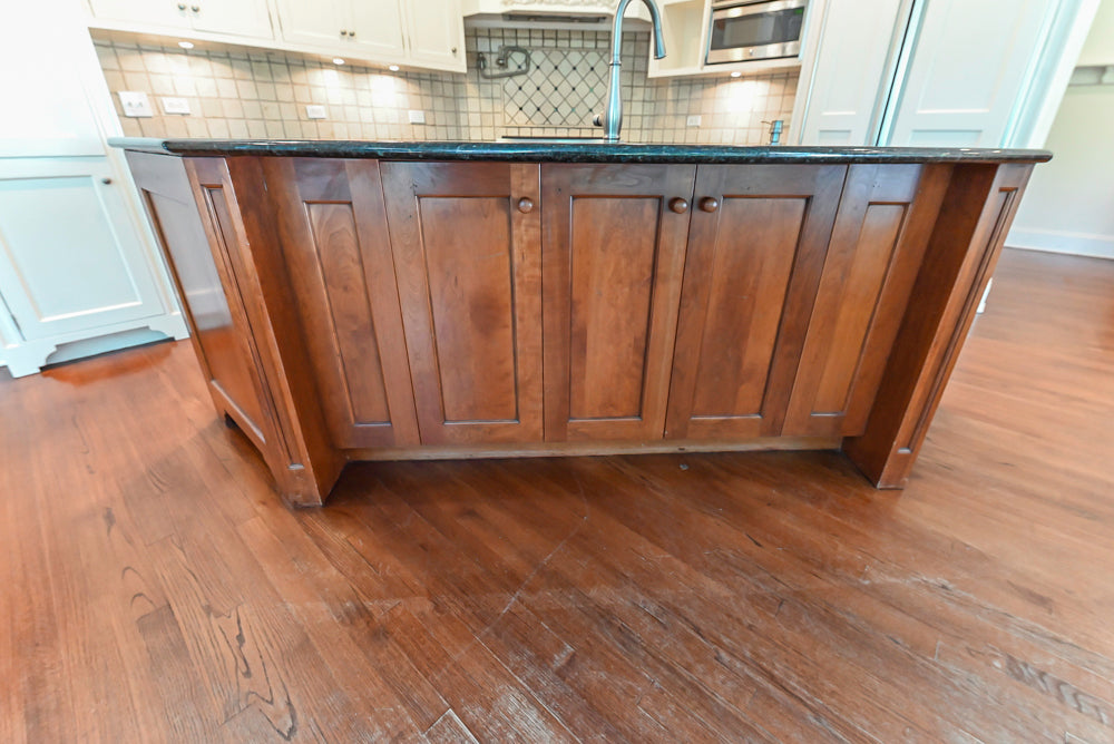 Custom Traditional White Kitchen with Wood Island, Granite Countertops and Wolf Range