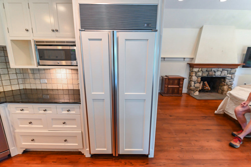 Custom Traditional White Kitchen with Wood Island, Granite Countertops and Wolf Range