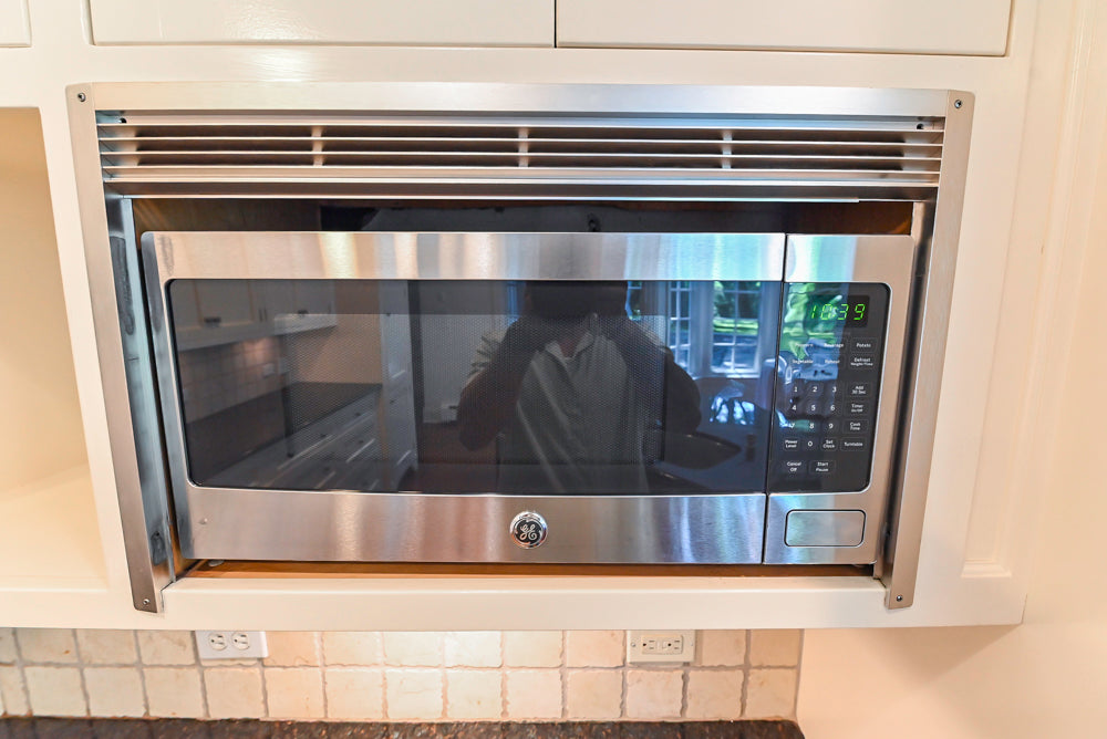 Custom Traditional White Kitchen with Wood Island, Granite Countertops and Wolf Range