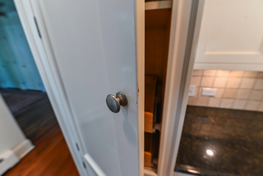 Custom Traditional White Kitchen with Wood Island, Granite Countertops and Wolf Range