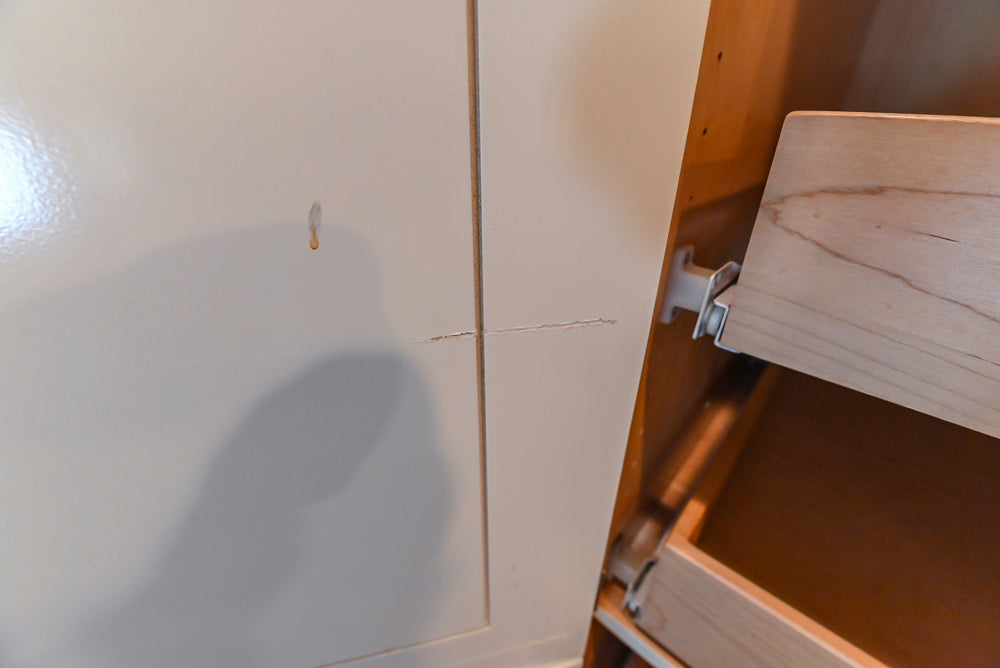 Custom Traditional White Kitchen with Wood Island, Granite Countertops and Wolf Range