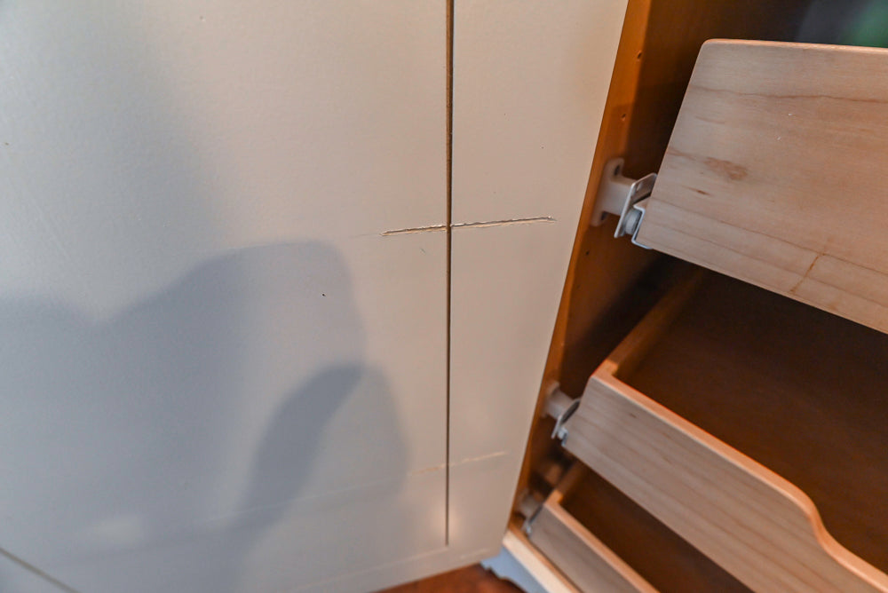 Custom Traditional White Kitchen with Wood Island, Granite Countertops and Wolf Range