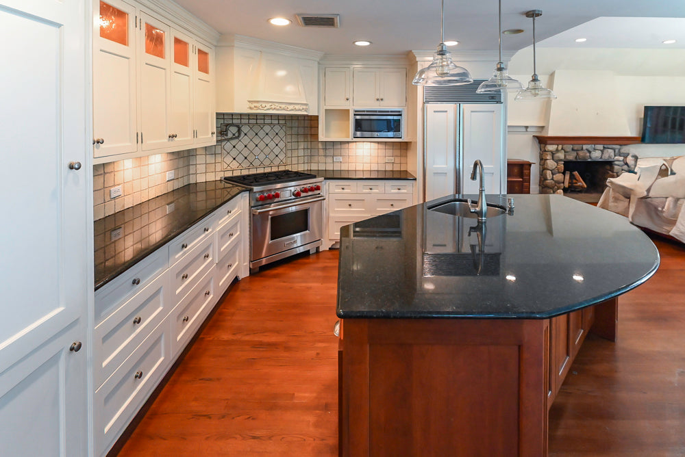 Custom Traditional White Kitchen with Wood Island, Granite Countertops and Wolf Range