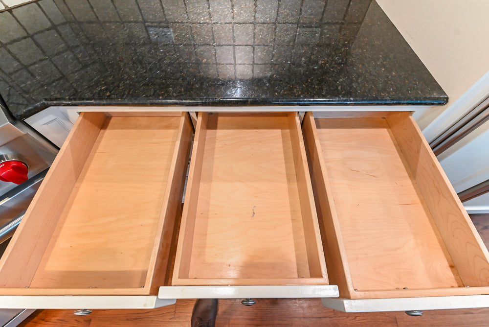 Custom Traditional White Kitchen with Wood Island, Granite Countertops and Wolf Range