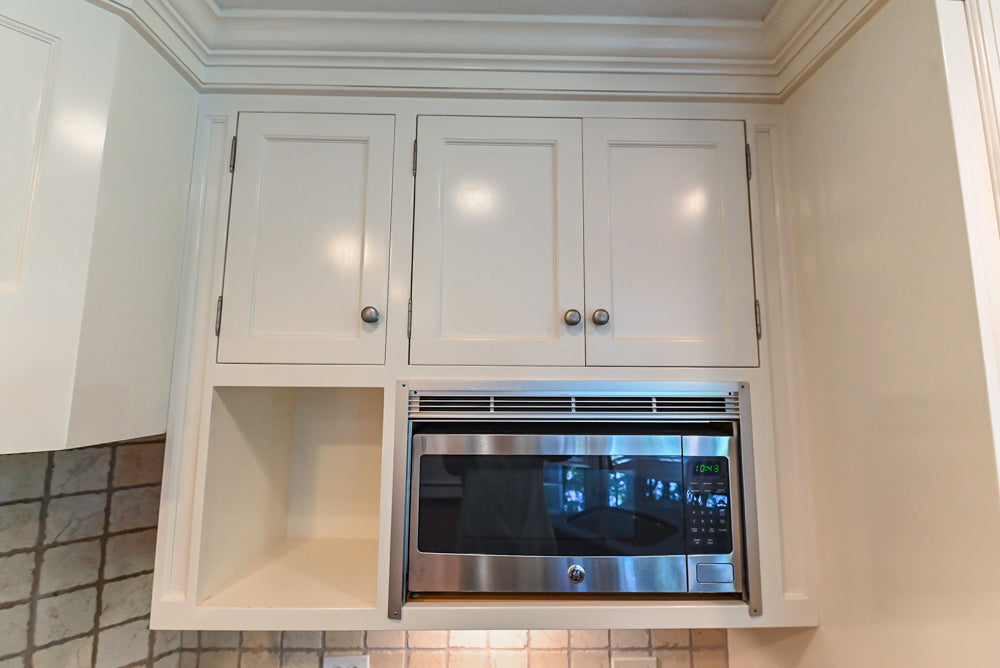 Custom Traditional White Kitchen with Wood Island, Granite Countertops and Wolf Range