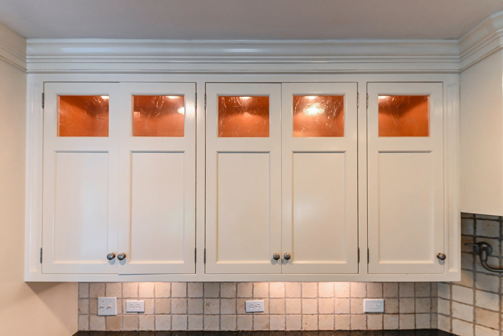 Custom Traditional White Kitchen with Wood Island, Granite Countertops and Wolf Range