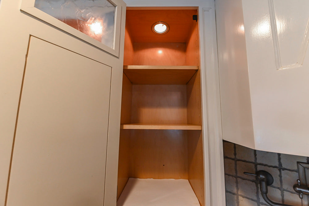 Custom Traditional White Kitchen with Wood Island, Granite Countertops and Wolf Range