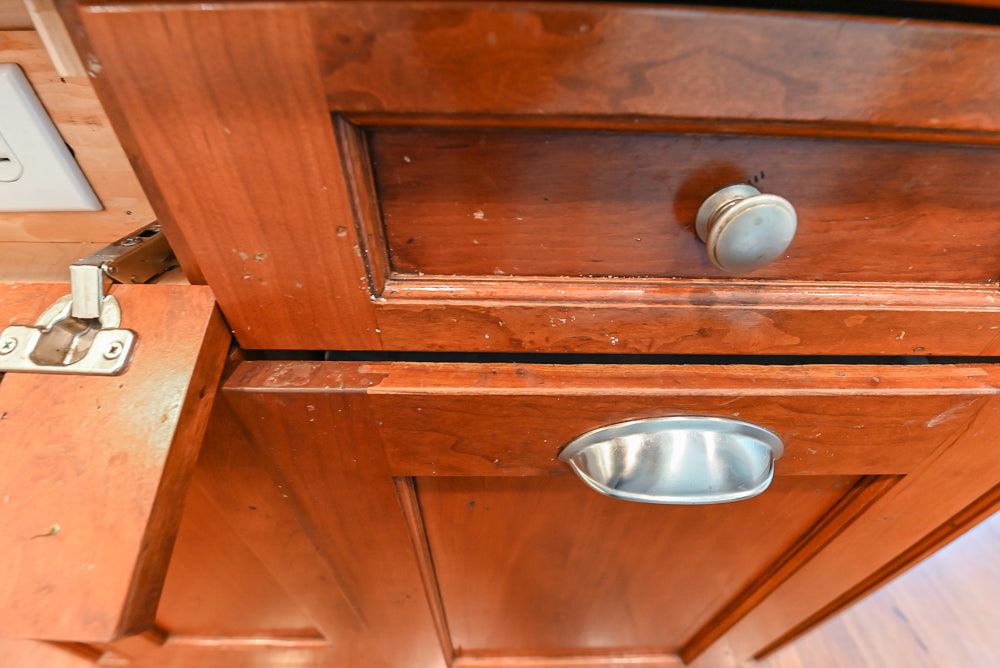 Custom Traditional White Kitchen with Wood Island, Granite Countertops and Wolf Range