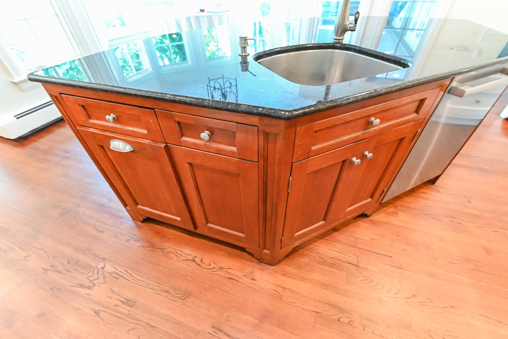 Custom Traditional White Kitchen with Wood Island, Granite Countertops and Wolf Range