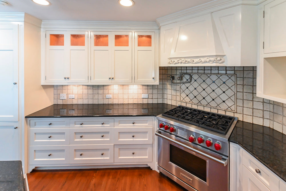 Custom Traditional White Kitchen with Wood Island, Granite Countertops and Wolf Range