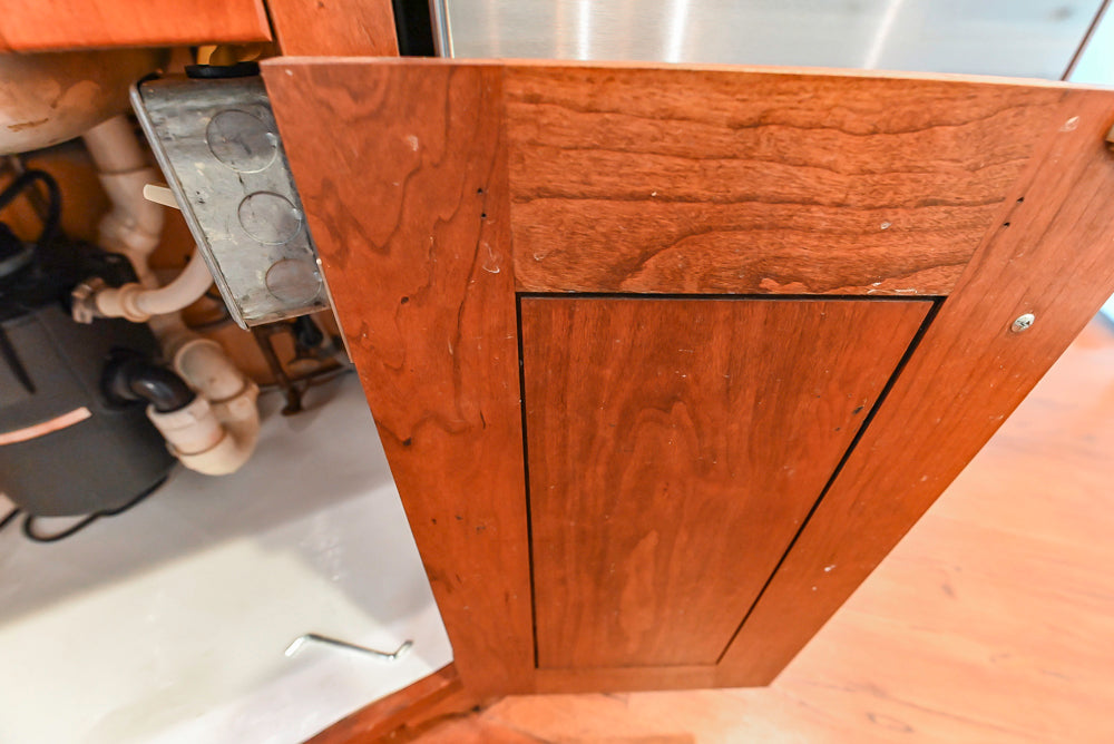 Custom Traditional White Kitchen with Wood Island, Granite Countertops and Wolf Range