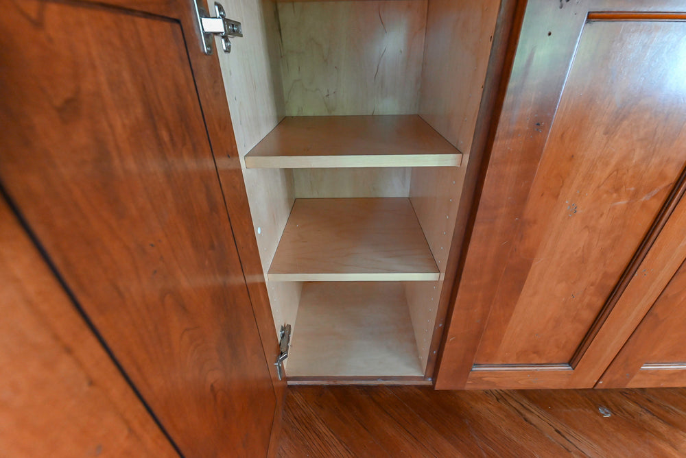 Custom Traditional White Kitchen with Wood Island, Granite Countertops and Wolf Range