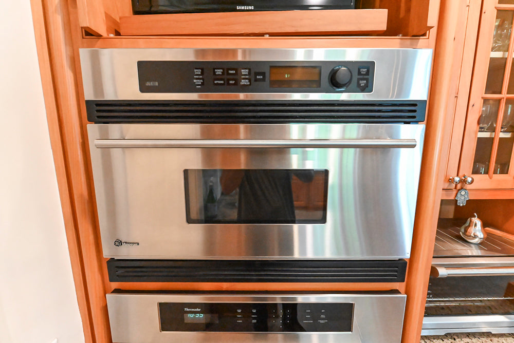 Custom Traditional Natural Wood Kitchen with Granite Countertops and Appliances