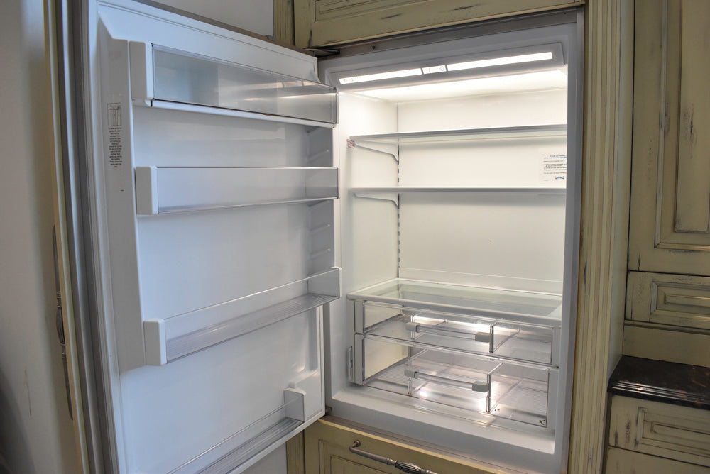 Custom Traditional Distressed Two-Tone Kitchen with Double Island, Stone Countertops and Sub-Zero & Wolf Appliances