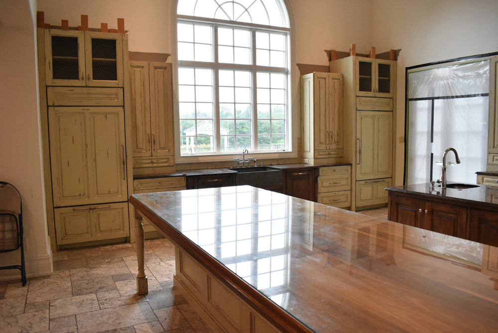 Custom Traditional Distressed Two-Tone Kitchen with Double Island, Stone Countertops and Sub-Zero & Wolf Appliances