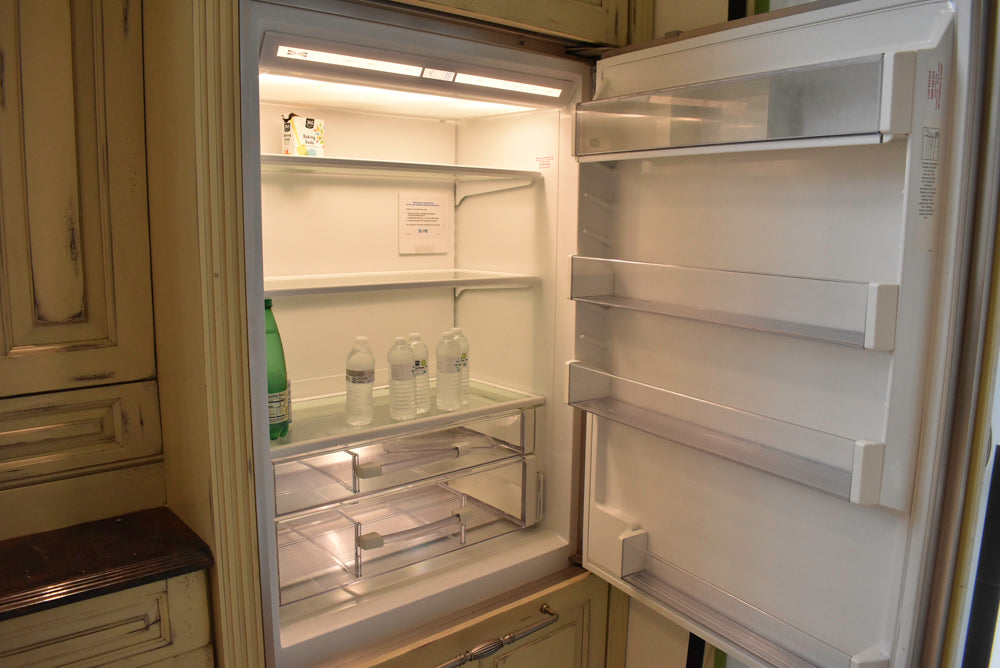 Custom Traditional Distressed Two-Tone Kitchen with Double Island, Stone Countertops and Sub-Zero & Wolf Appliances