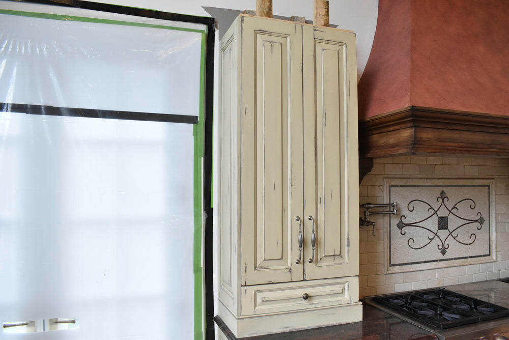 Custom Traditional Distressed Two-Tone Kitchen with Double Island, Stone Countertops and Sub-Zero & Wolf Appliances