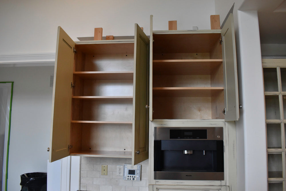 Custom Traditional Distressed Two-Tone Kitchen with Double Island, Stone Countertops and Sub-Zero & Wolf Appliances