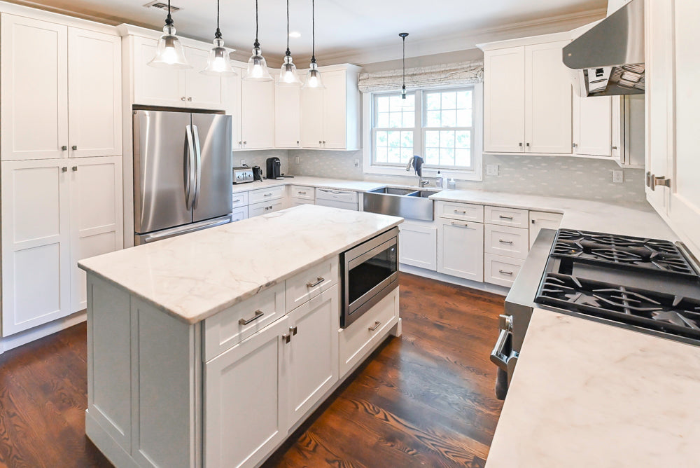 Fabuwood Transitional White Kitchen with Island and White Marble Countertops