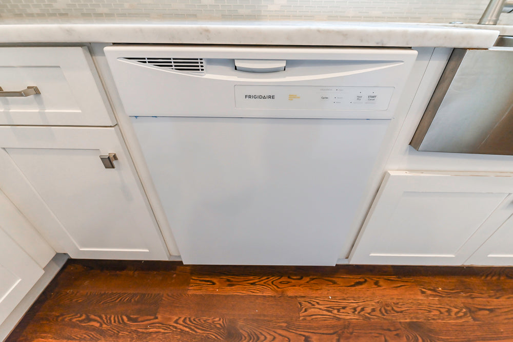 Fabuwood Transitional White Kitchen with Island and White Marble Countertops