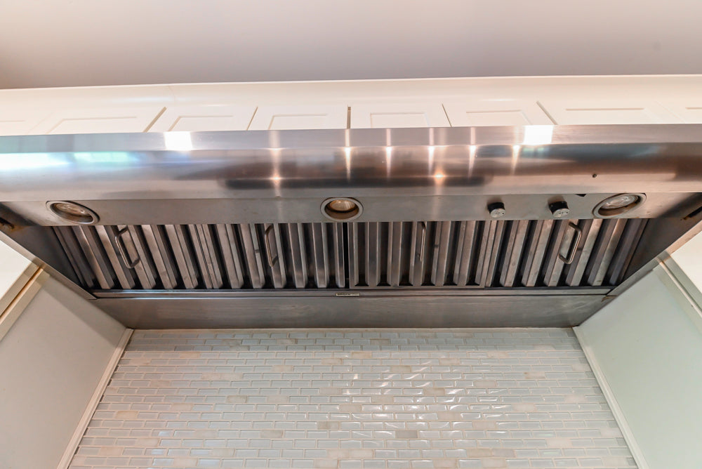 Fabuwood Transitional White Kitchen with Island and White Marble Countertops