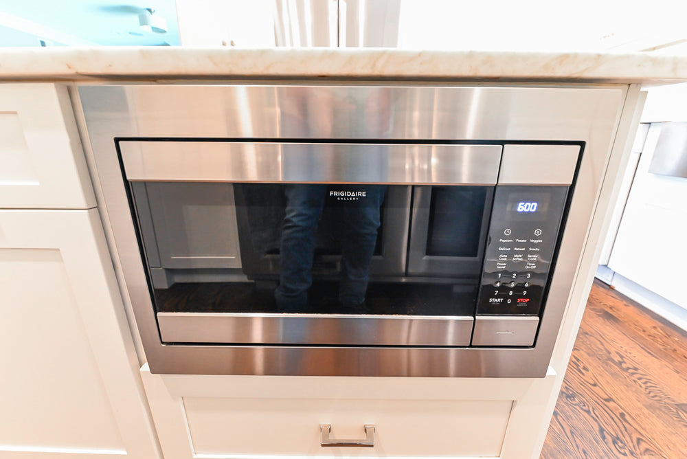 Fabuwood Transitional White Kitchen with Island and White Marble Countertops