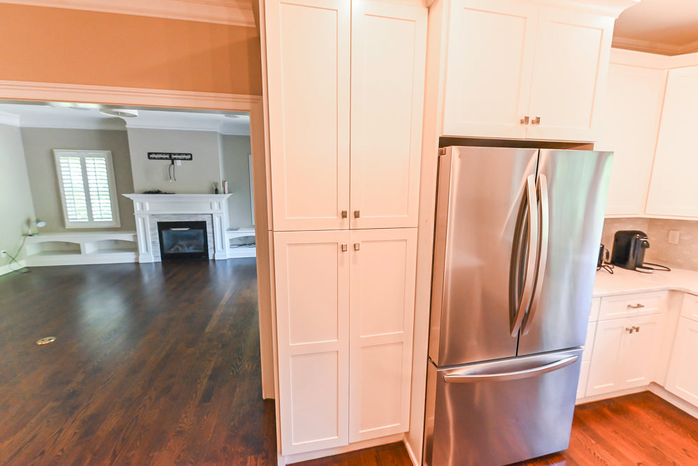 Fabuwood Transitional White Kitchen with Island and White Marble Countertops