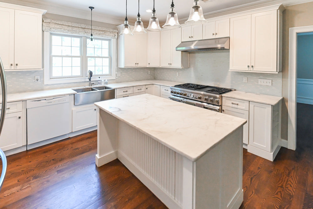 Fabuwood Transitional White Kitchen with Island and White Marble Countertops