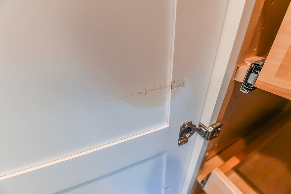 Fabuwood Transitional White Kitchen with Island and White Marble Countertops
