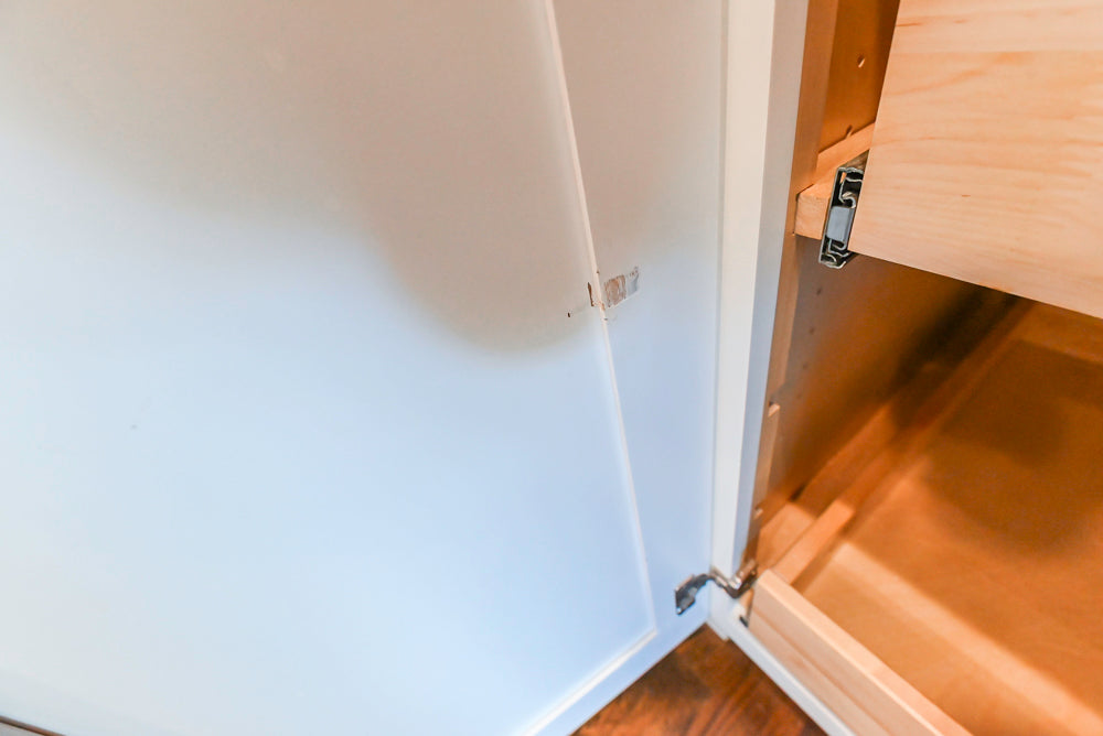 Fabuwood Transitional White Kitchen with Island and White Marble Countertops