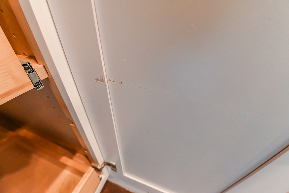 Fabuwood Transitional White Kitchen with Island and White Marble Countertops