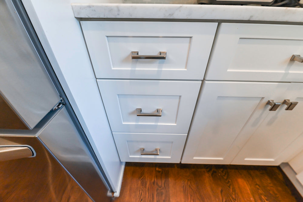 Fabuwood Transitional White Kitchen with Island and White Marble Countertops