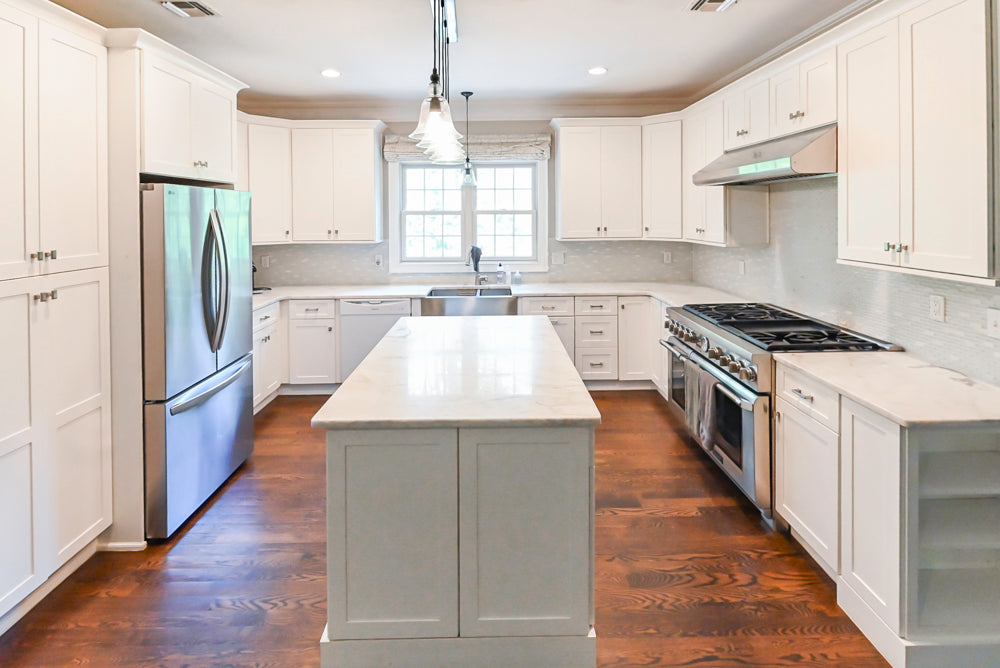 Fabuwood Transitional White Kitchen with Island and White Marble Countertops