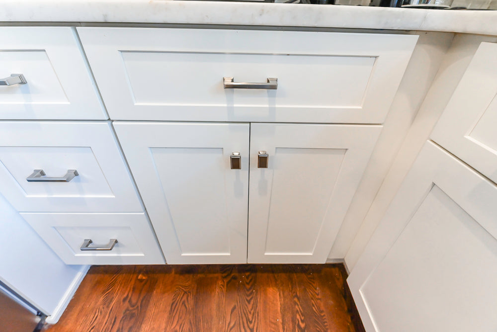 Fabuwood Transitional White Kitchen with Island and White Marble Countertops