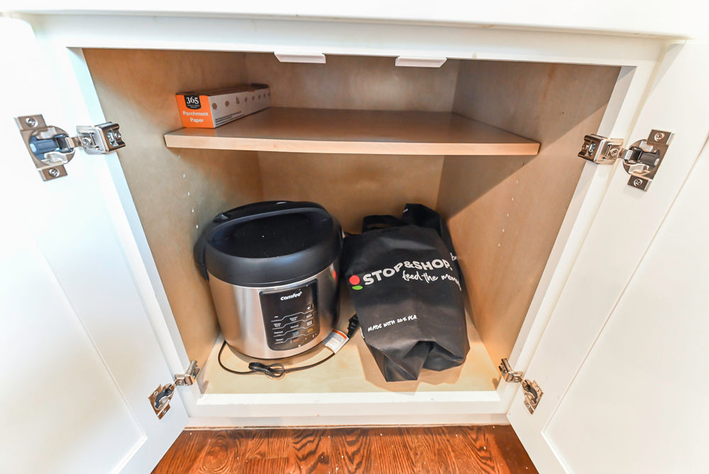 Fabuwood Transitional White Kitchen with Island and White Marble Countertops