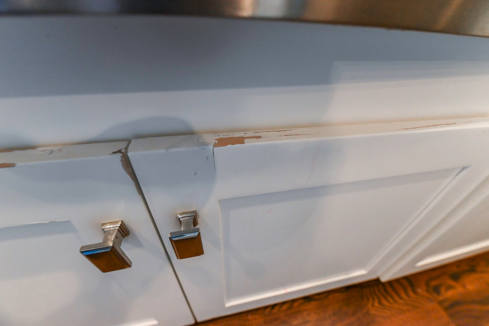 Fabuwood Transitional White Kitchen with Island and White Marble Countertops