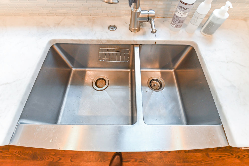 Fabuwood Transitional White Kitchen with Island and White Marble Countertops