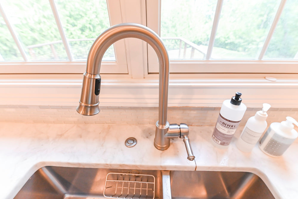 Fabuwood Transitional White Kitchen with Island and White Marble Countertops