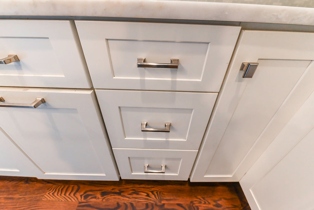 Fabuwood Transitional White Kitchen with Island and White Marble Countertops
