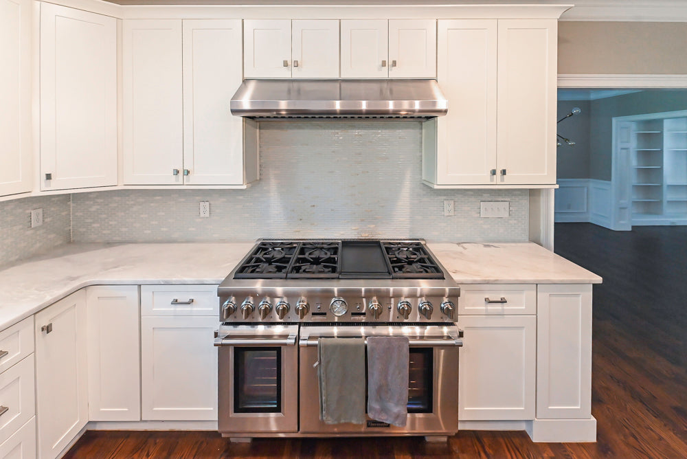 Fabuwood Transitional White Kitchen with Island and White Marble Countertops