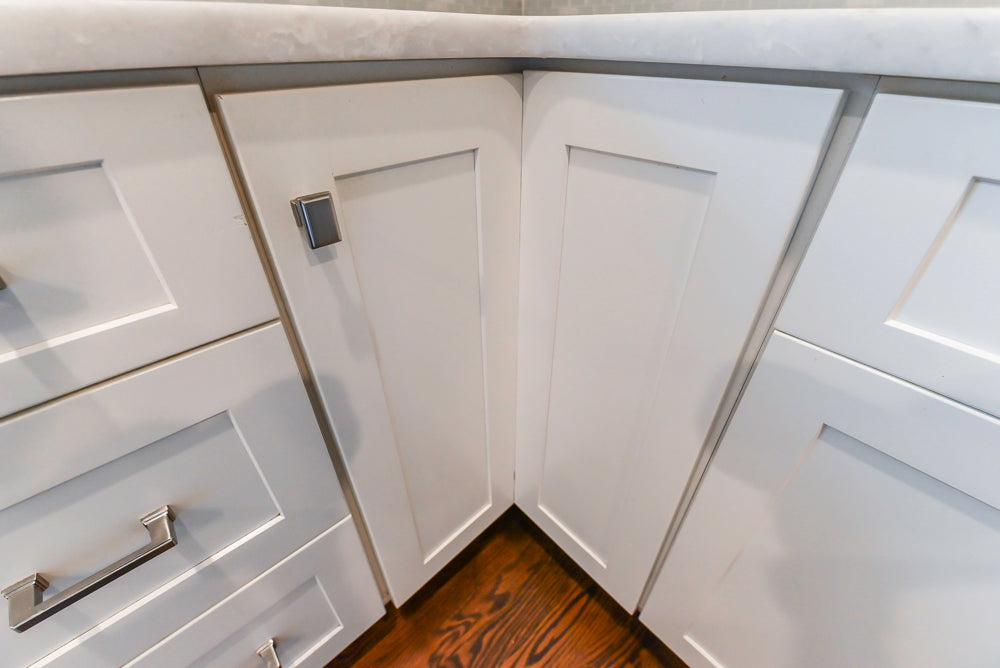 Fabuwood Transitional White Kitchen with Island and White Marble Countertops