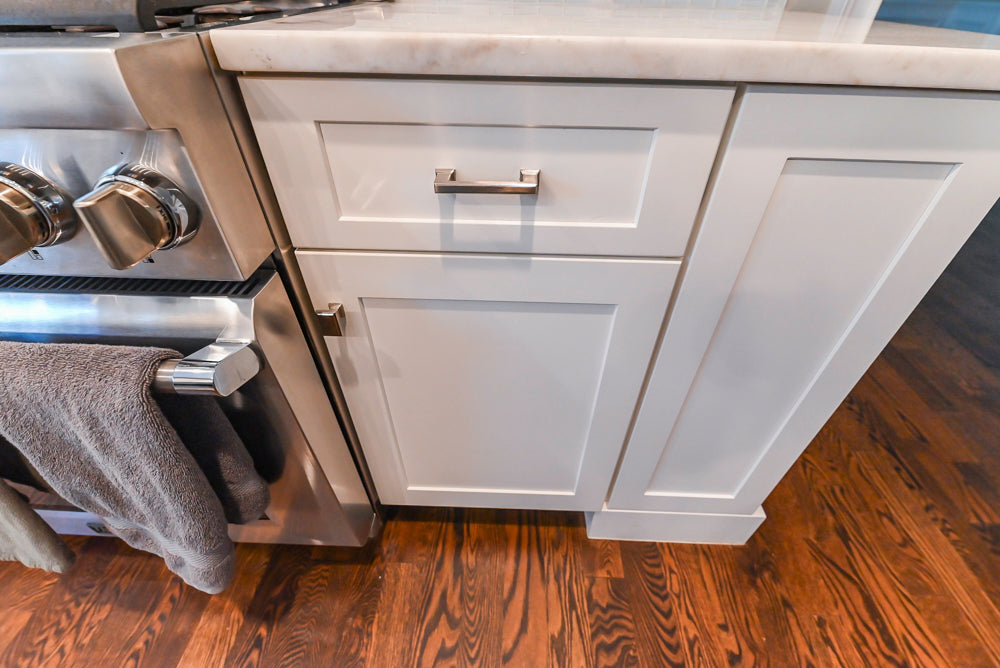Fabuwood Transitional White Kitchen with Island and White Marble Countertops
