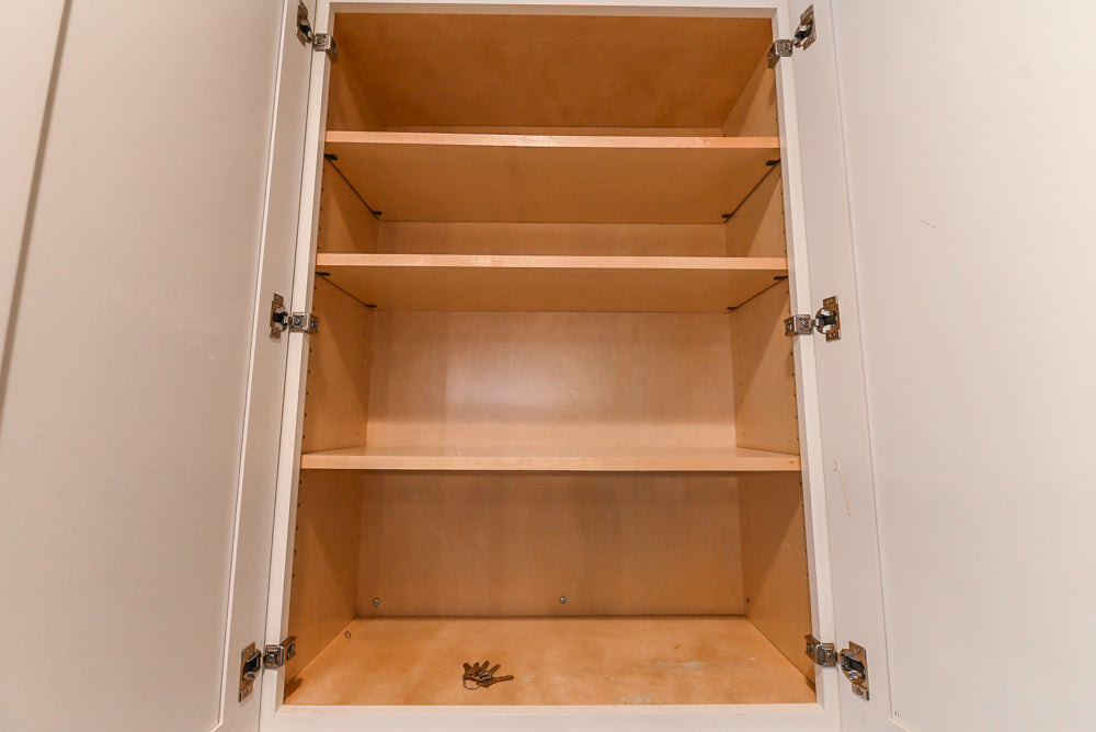 Fabuwood Transitional White Kitchen with Island and White Marble Countertops